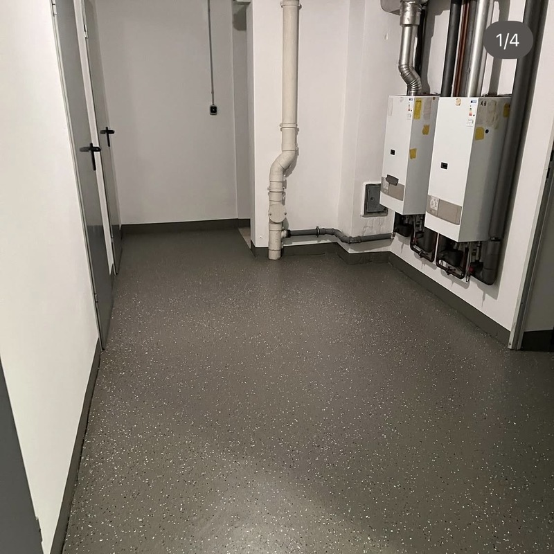 Kellerbodenbeschichtung in einem Mehrfamilienhau 